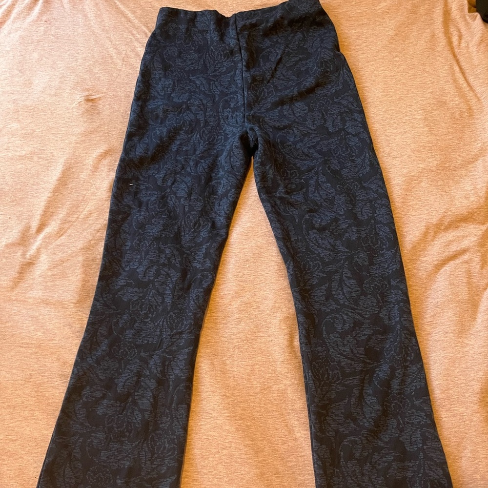 Stretchy pants with a floral pattern. Never worn.